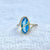 Elegant Natural Blue Topaz in Marquise Shape with Diamonds in 14K Gold Ring image 0