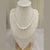 Natural pearl single line oval bead necklace – Tushar Gems