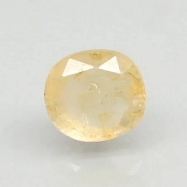 Natural Yellow Sapphire (Pukhraj) oval mixed cut loose gemstone, report no. 8980D36552