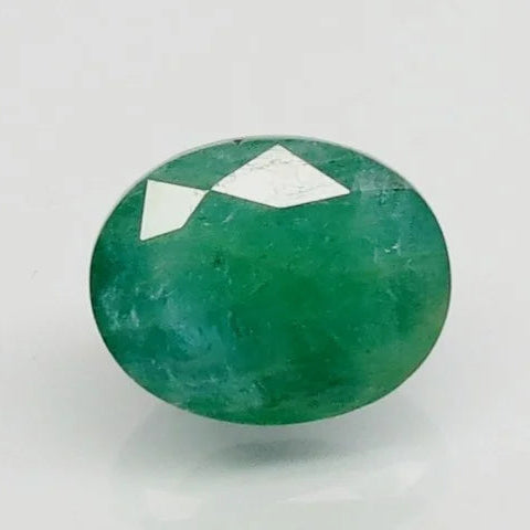 Natural Emerald 12.26 Ratti Govt. Lab Certified | Oval Mixed Cut | Certificate No.: 6938D27085 image 0