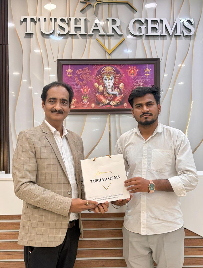 Ravi Kapoor with a customer at the Tushar Gems showroom